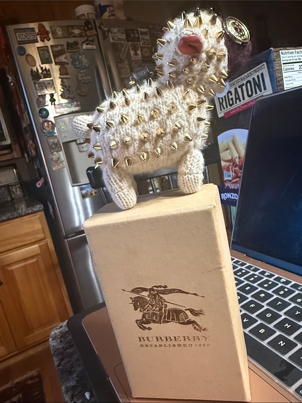 Burberry Ivory Knit Studded Ornament with Gold Accents
